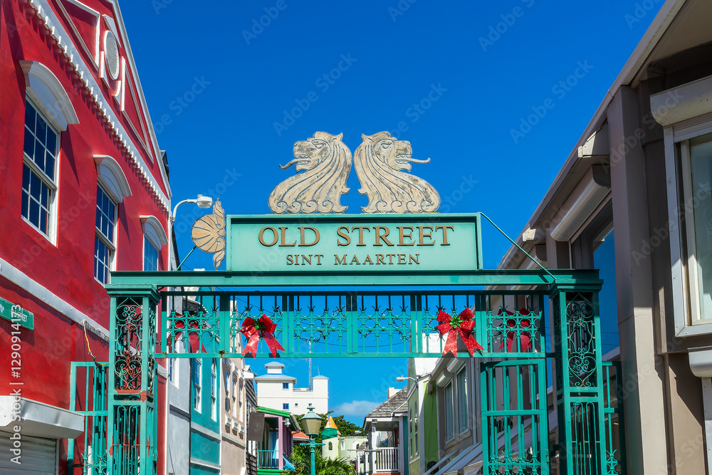 Old street sign, colorful cityscape in Philipsburg, Caribbean travel, Sint Maarten island (Saint Martin), Dutch West Indies
