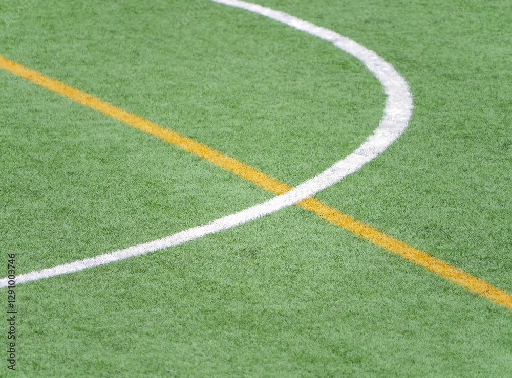 Close up of soccer field markings on artificial green turf Close up of soccer field markings on artificial green turf