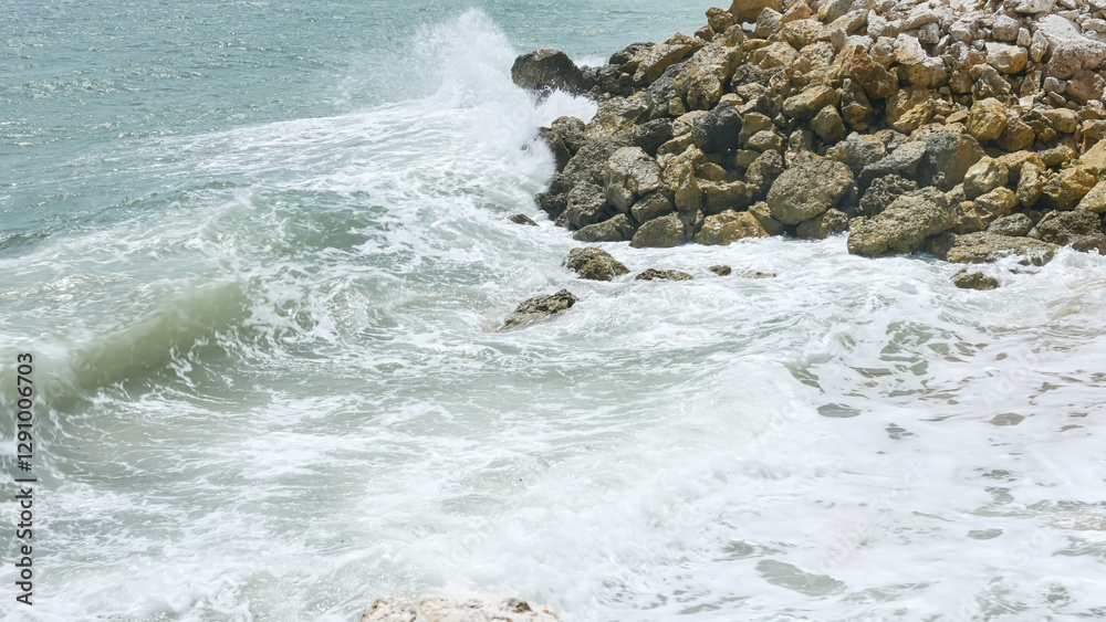 Fototapeta premium BALI, INDONESIA - JANUARY 22, 2018: Ocean Ocean waves hit rocks near Pandawa Beach, Bali.