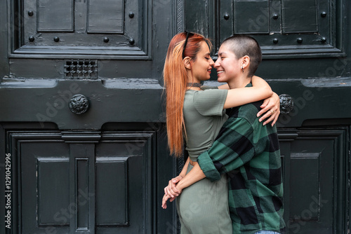 Colombian lesbian couple embracing in a display of love and equality