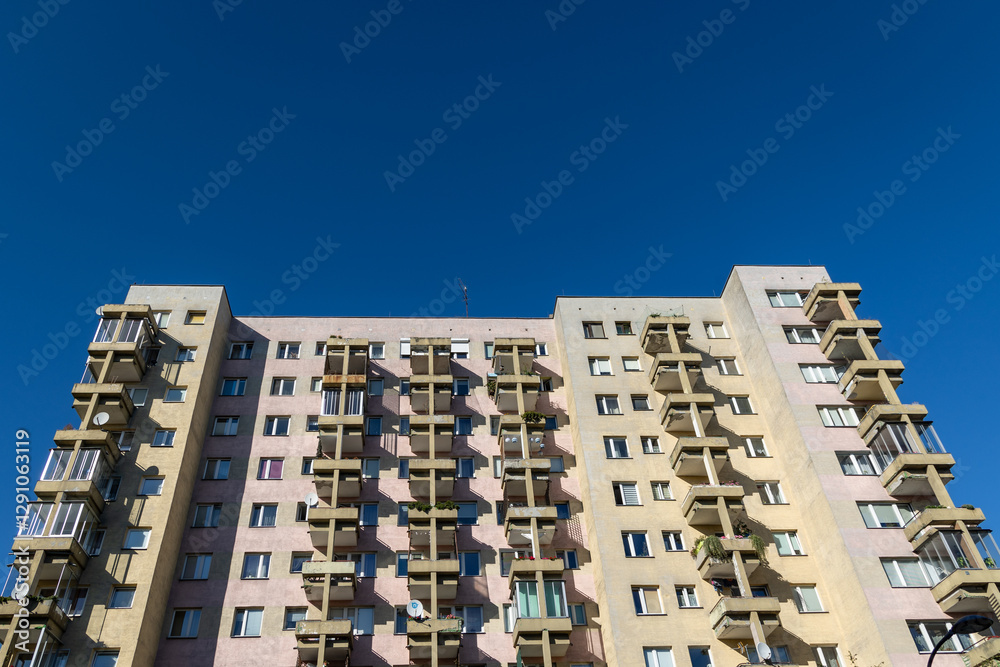 Facade of old type of apartment building. Abrahama Street in Goclaw area of Warsaw, Poland