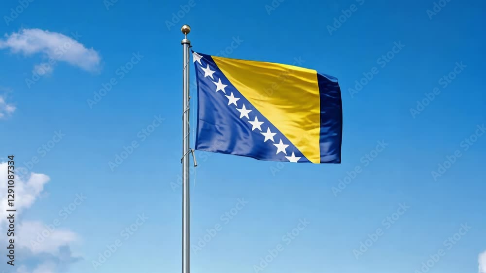 National flag of Bosnia Herzegovina waving on blue sky, banner on the wind