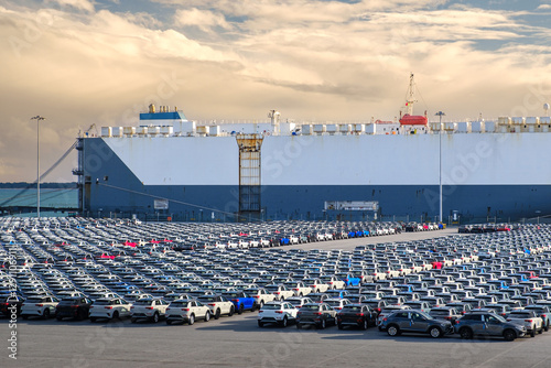 Obraz na płótnie Automobile transport ship or Ro-Ro docked at the port with parked w salonie