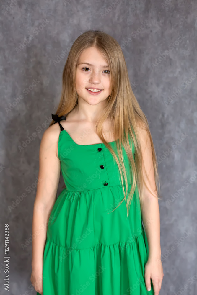 a beautiful blonde girl with big brown eyes a smiling in Green Dress a beautiful blonde girl with big brown eyes a smiling in Green Dress