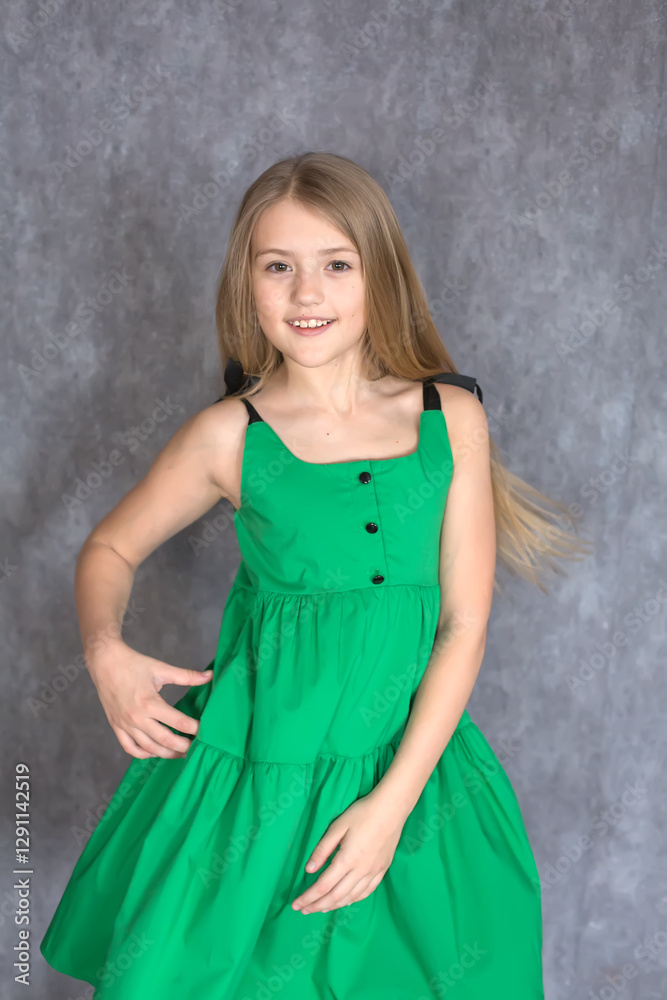 a beautiful blonde girl with big brown eyes a smiling in Green Dress a beautiful blonde girl with big brown eyes a smiling in Green Dress