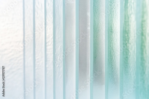 Glass Panes: An abstract perspective showcases a row of glass panes with varying textures and a subtle gradient of colors, highlighting transparency, clarity, and the interplay of light and shadow. 