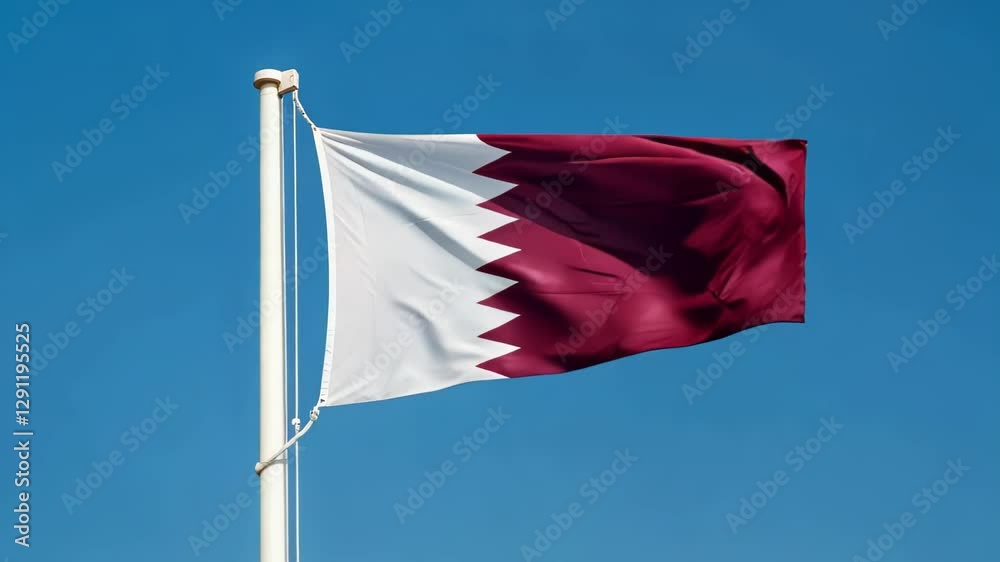 Qatar national flag of waving on blue sky, banner on the wind