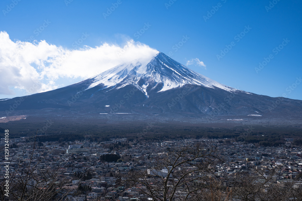 View of Mount Fuji on a clear day Taking pictures from the mountain You will see a city in the foreground. And there are branches in winter View of Mount Fuji on a clear day Taking pictures from the mountain You will see a city in the foreground. And there are branches in winter