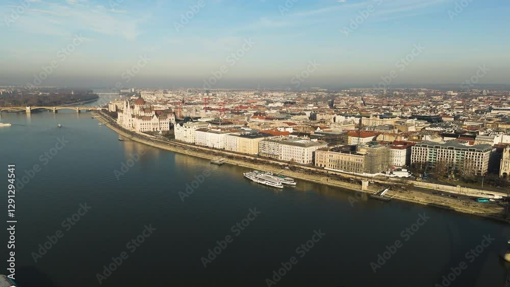 Aerial overview of Budapest, Hungary, at golden hour, the Danube River and historic architecture Aerial overview of Budapest, Hungary, at golden hour, the Danube River and historic architecture