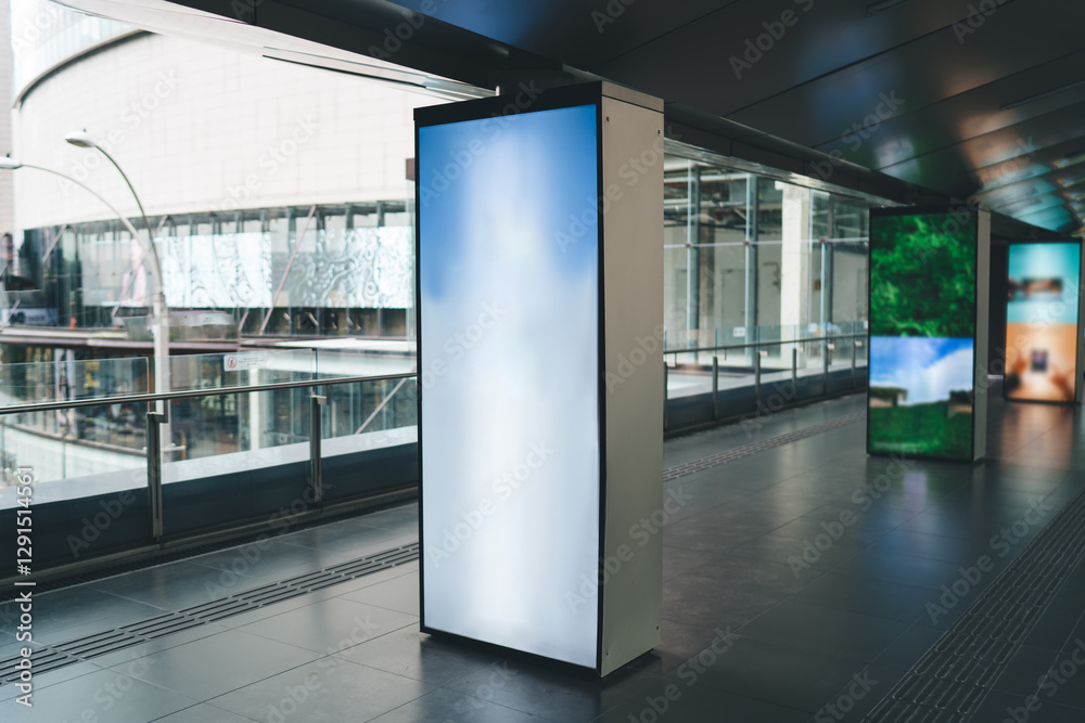 Obraz premium Modern electronic display board at walkway in modern building