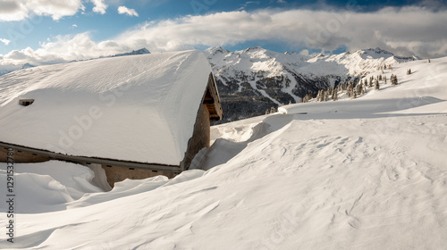 Snowshoeing to the Fevri malga on Mount Spinale. Easy snowshoe hike from Madonna di Campiglio (1h30/2h). Wonderful views of the Brenta Dolomites, Madonna di Campiglio, Trentino, Italy