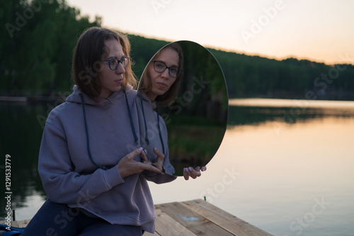 Woman on the pier at lake