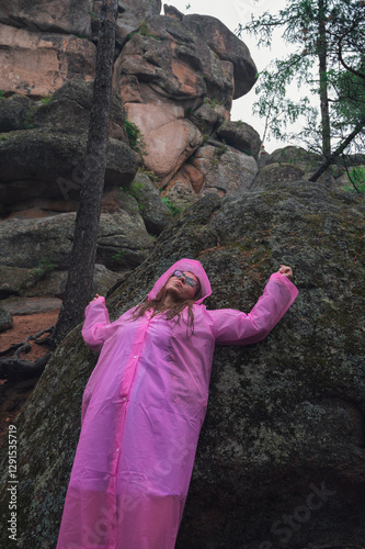 Woman in the taiga forest a...