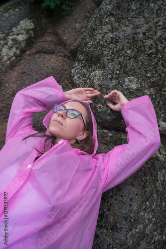 Woman in the taiga forest a...