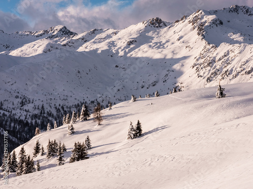 Snowshoeing to the Fevri malga on Mount Spinale. Easy snowshoe hike from Madonna di Campiglio (1h30/2h). Wonderful views of the Brenta Dolomites, Madonna di Campiglio, Trentino, Italy