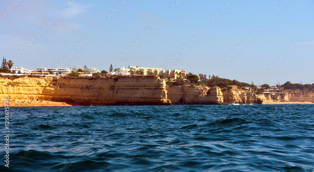 The Algarve Rocks Formation is a unique and stunning natural wonder located in the coastal town of Porches Portugal The Algarve Rocks Formation is a unique and stunning natural wonder located in the coastal town of Porches Portugal