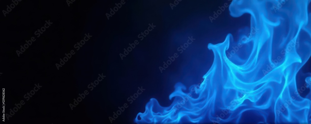 Fototapeta premium Intense blue fire bursts against a completely black background , cool, glowing, image