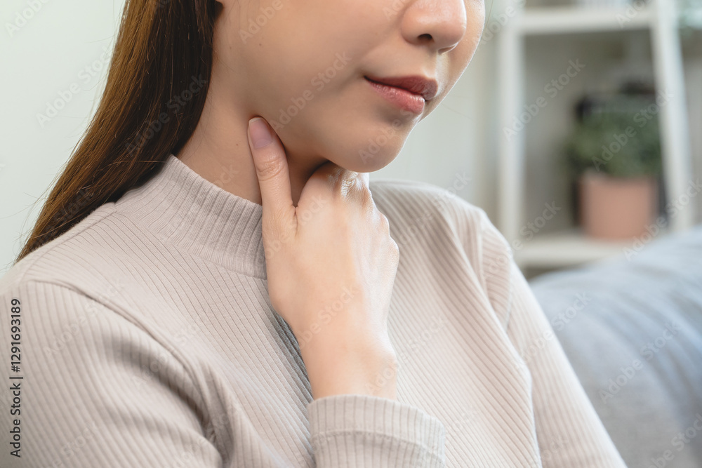 Female unhealthy Sickness, asian young woman, girl unwell and coughing, have cold, sore throat isolated white background suffering with symptom cough feeling bad. Healthcare of Coronavirus, covid-19. Female unhealthy Sickness, asian young woman, girl unwell and coughing, have cold, sore throat isolated white background suffering with symptom cough feeling bad. Healthcare of Coronavirus, covid-19.