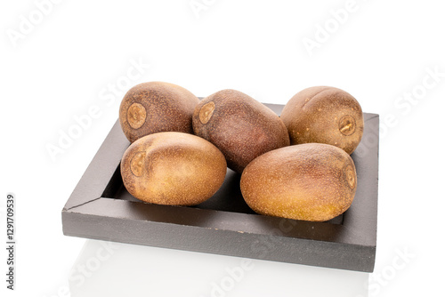 Wallpaper Mural Several ripe kiwis on a black wooden tray, macro, isolated on a white background. Torontodigital.ca