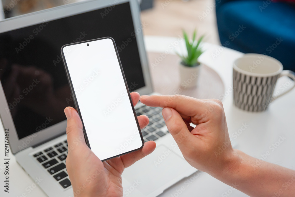 Man holding smart phone with blank screen Man holding smart phone with blank screen