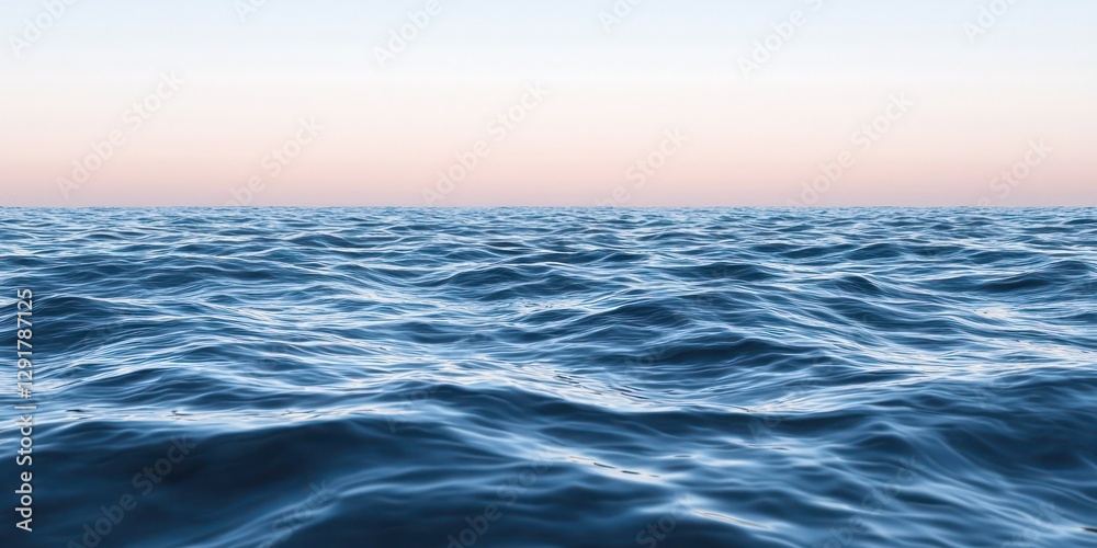 Fototapeta premium A tranquil ocean scene with gentle waves and a pastel horizon