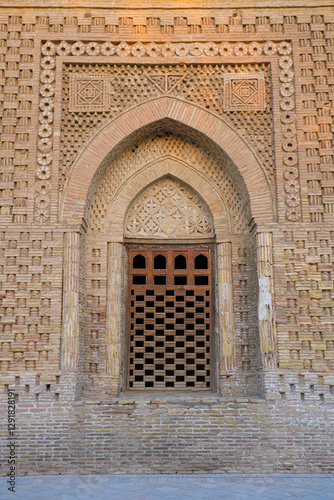 Pointed arch with spandrels surrounding the main door of the Samanid Mausoleum in Bukhara, Uzbekistan, Central Asia photo