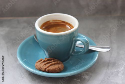 cup of coffee with cookies