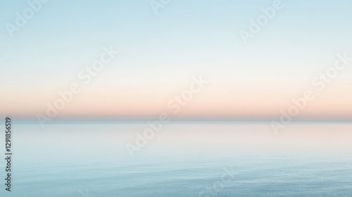 Wallpaper Mural A serene seascape featuring calm waters and a gradient sky at dawn, capturing the peaceful ambiance of sunrise. Torontodigital.ca