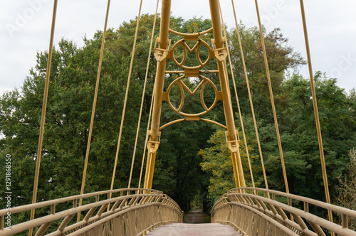 Footbridge connecting parts of the historic dike, which was built in the 16th century (Bierunska grobla). Bierun, Poland. photo