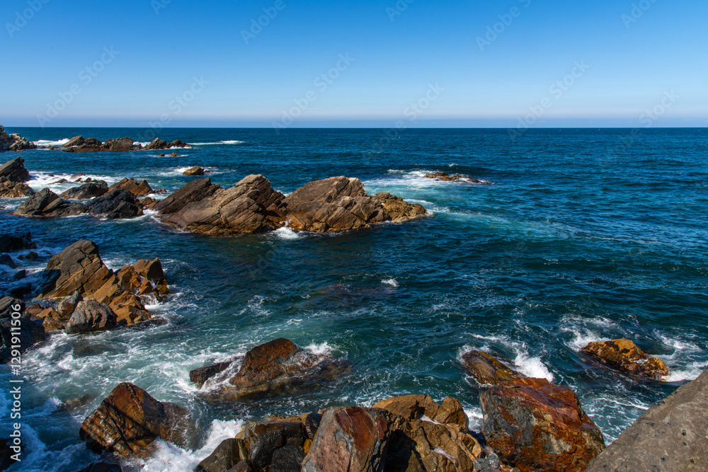 View of the rocks and surf on the sea View of the rocks and surf on the sea