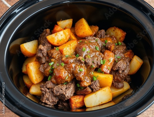 Wallpaper Mural Slow-cooked beef and potato stew with rich sauce and fresh herbs in crockpot Torontodigital.ca
