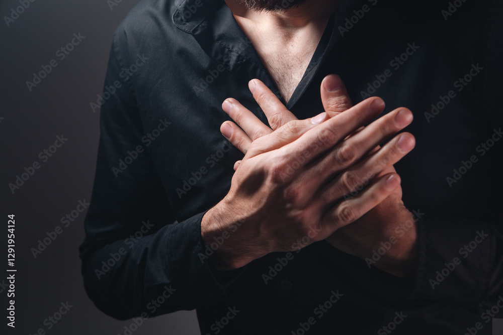 close up of man suffering from pain in the chest