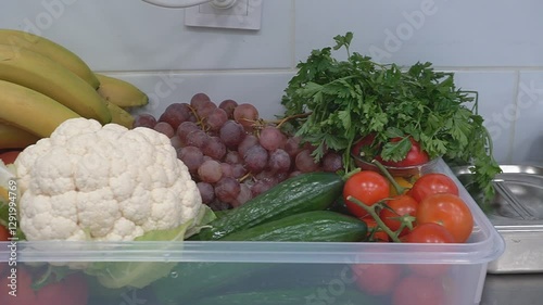 Vegetables and fruits folded in a basket
