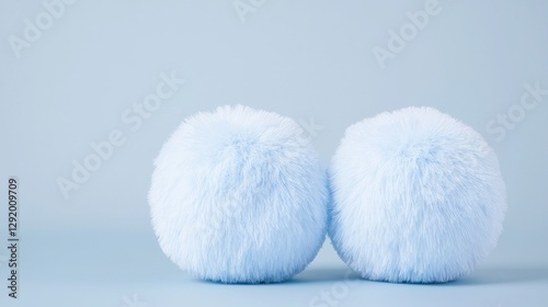 Light Blue Fluffy Pom-poms Studio Shot