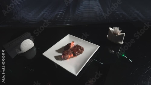 Wallpaper Mural The chef sets fire to a meat steak placed on a platter before serving. Torontodigital.ca