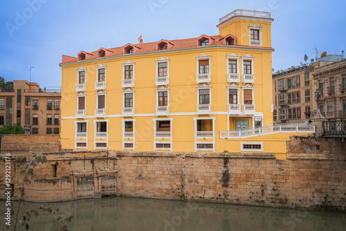 Old historical building along the Segura river in Murcia, Spain