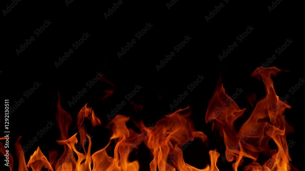 Super Slow Motion Shot of Burning Fire Flames isolated on Black Background . Filmed on High Speed Cinematic Camera at 1000 FPS .