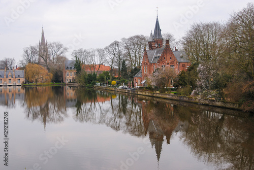 Tranquil Minnewater Lake in Minnewater Park, Bruges, Belgium