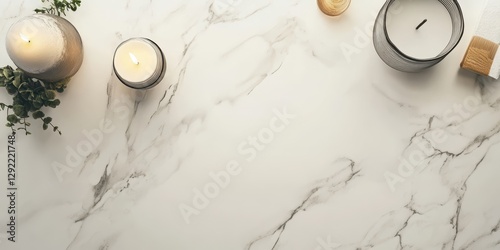 Candles and decorative items are arranged on a marble surface