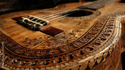 vA close-up of a vintage acoustic guitar with intricate inlays, capturing the texture of the wood and strings.

 photo