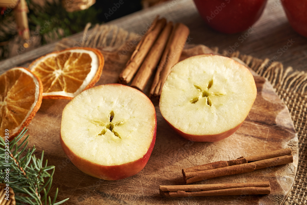 Fresh red apple with a star in the middle, with Christmas decoration Fresh red apple with a star in the middle, with Christmas decoration
