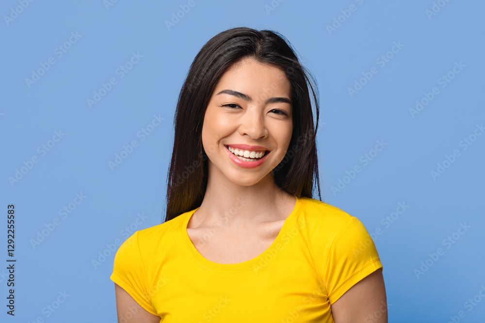 Pure Happiness. Closeup Portraif Of Joyful Asian Girl Sincerely Widely Smiling, Posing Over Purple Background In Studio, Free Space Pure Happiness. Closeup Portraif Of Joyful Asian Girl Sincerely Widely Smiling, Posing Over Purple Background In Studio, Free Space
