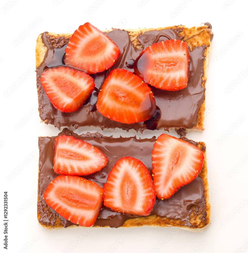 Delicious chocolate spread toast topped with fresh strawberries ready for breakfast Delicious chocolate spread toast topped with fresh strawberries ready for breakfast