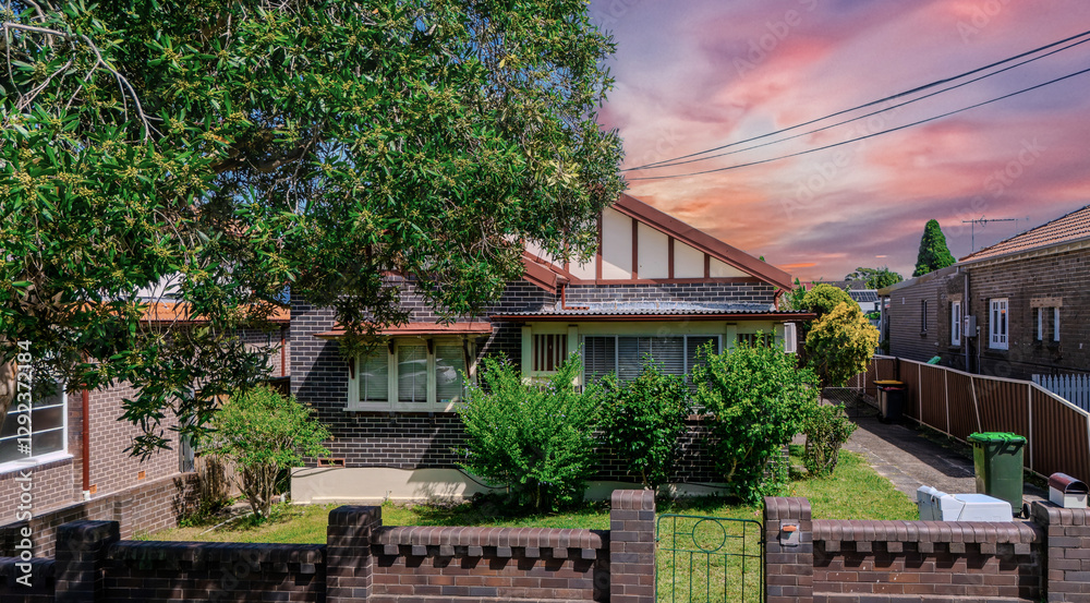 Old Federation Double Brick house in an inner western Sydney Suburb at beautiful colourful sunset NSW Australia Old Federation Double Brick house in an inner western Sydney Suburb at beautiful colourful sunset NSW Australia