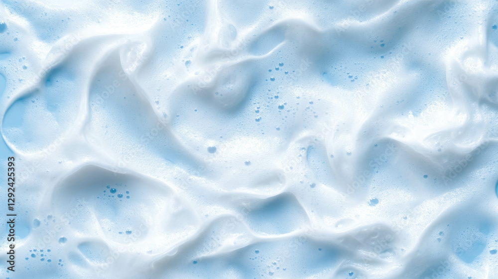 Soft white foam texture with subtle light blue accents for design and backgrounds Soft white foam texture with subtle light blue accents for design and backgrounds