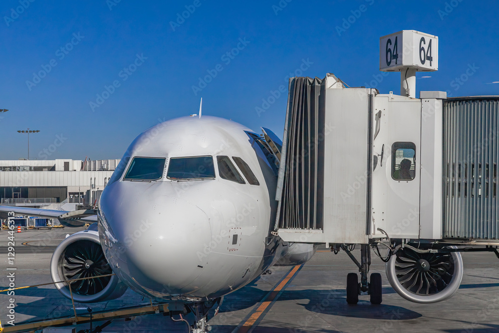 Airplane with Jet Bridge Attached for Passenger Boarding