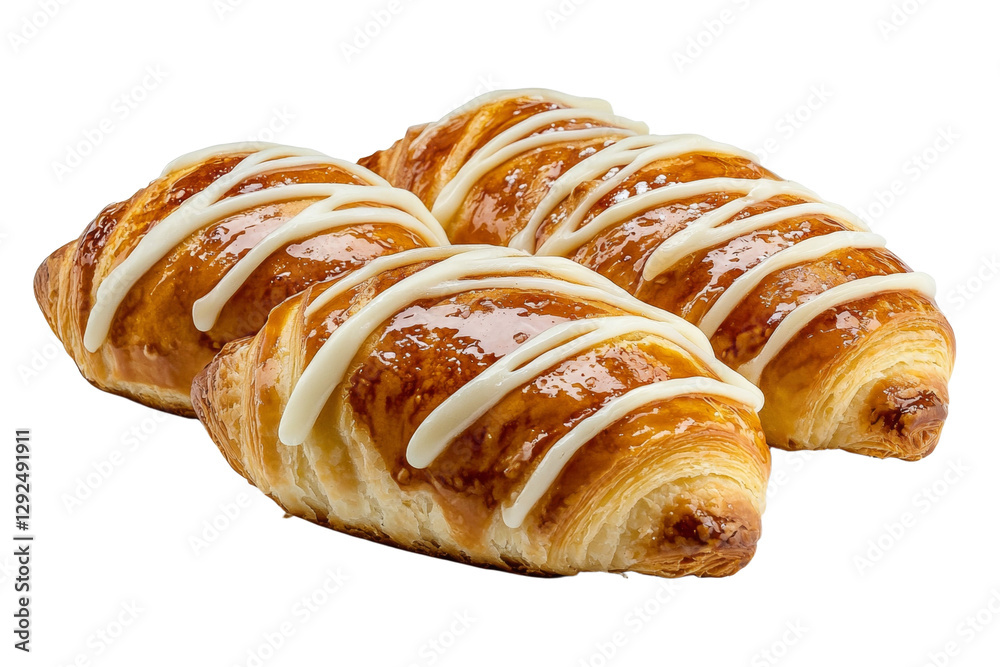 Three croissants with a white glaze on top, isolated