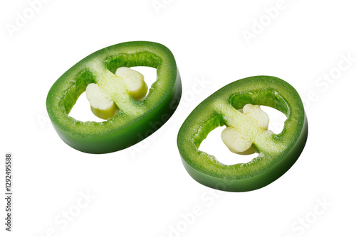 Two green jalapeno peppers are cut in half, isolated
