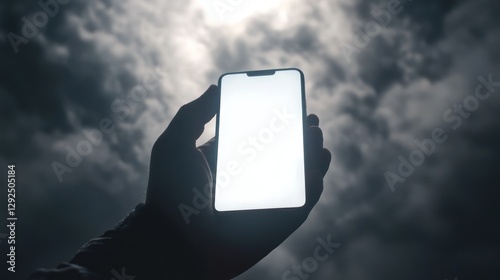 Hand holds bright phone, stormy sky backdrop; mockup
