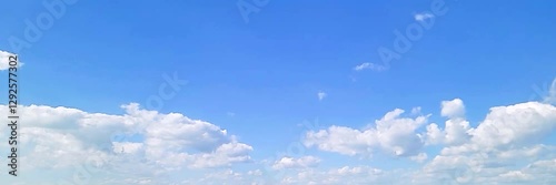 Cloudscape, Timelapse of a beautiful blue sky with fluffy white clouds, for a wide background	
